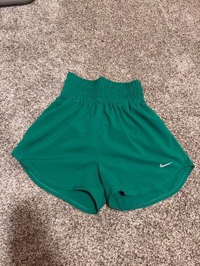 Nike Women's one dri fit ultra high rise Athletic Shorts in Emerald Green